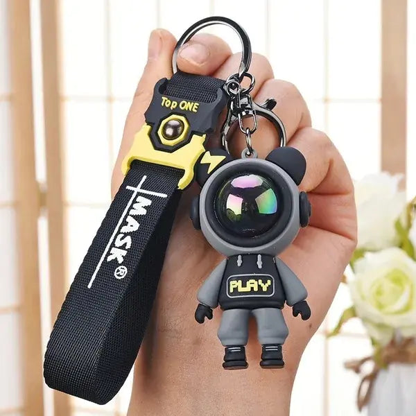CosmoBear™ Lightning Astronaut Keychain — Colorful Cartoon Design