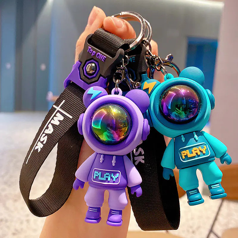 CosmoBear™ Lightning Astronaut Keychain — Colorful Cartoon Design