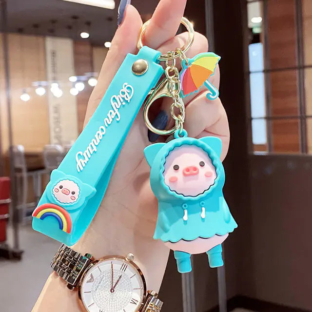 RainPiggy™ Keychain — Cute Pig in Raincoat Design