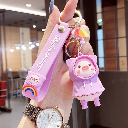 RainPiggy™ Keychain — Cute Pig in Raincoat Design