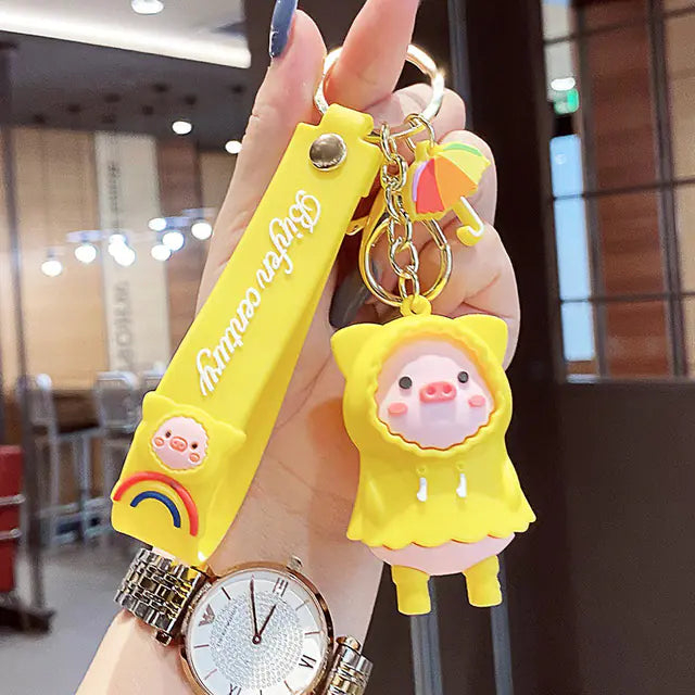 RainPiggy™ Keychain — Cute Pig in Raincoat Design